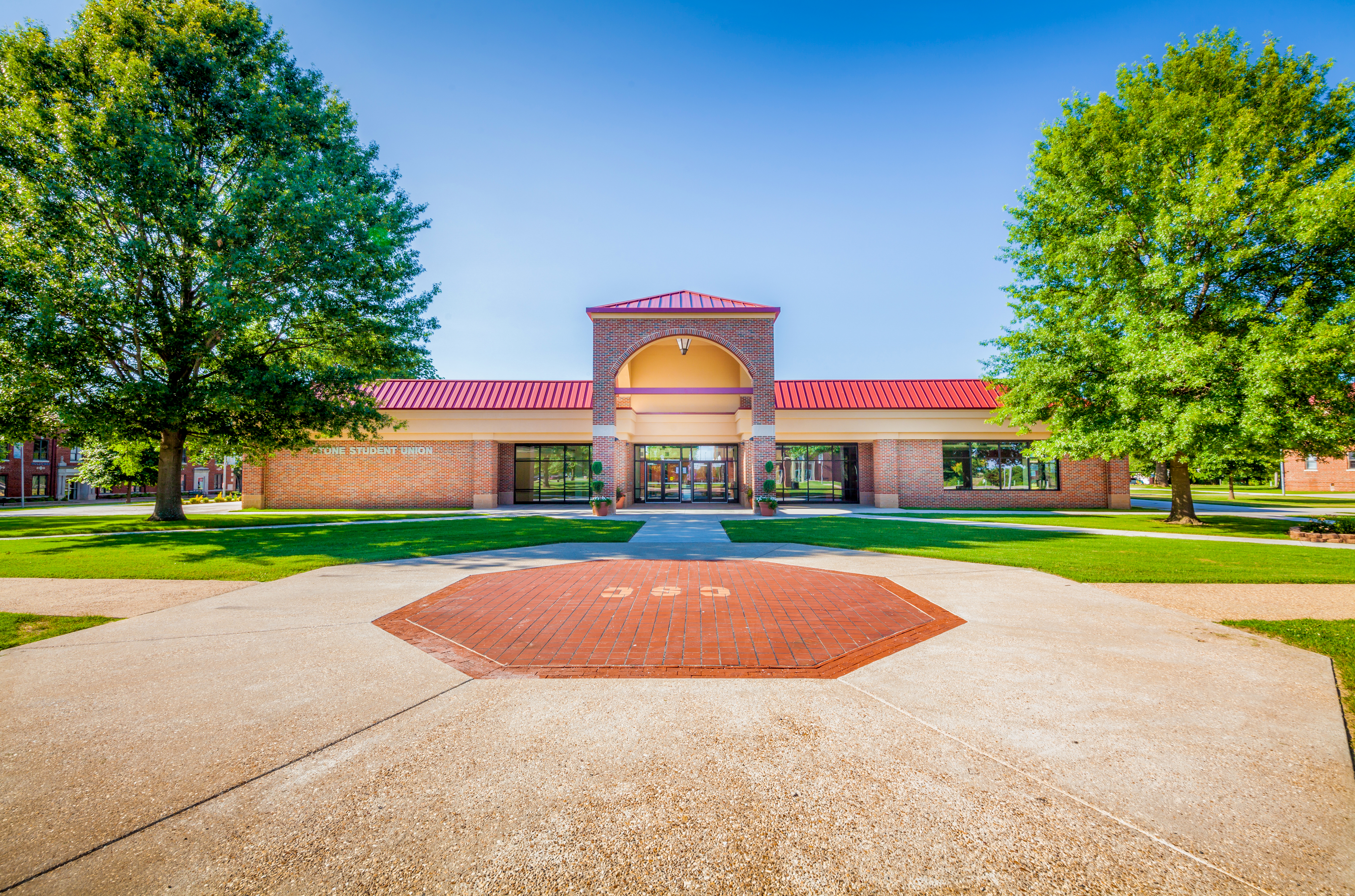 Beautiful view of the CSC Stone Student Union on Connors State College Campus on a sunny day