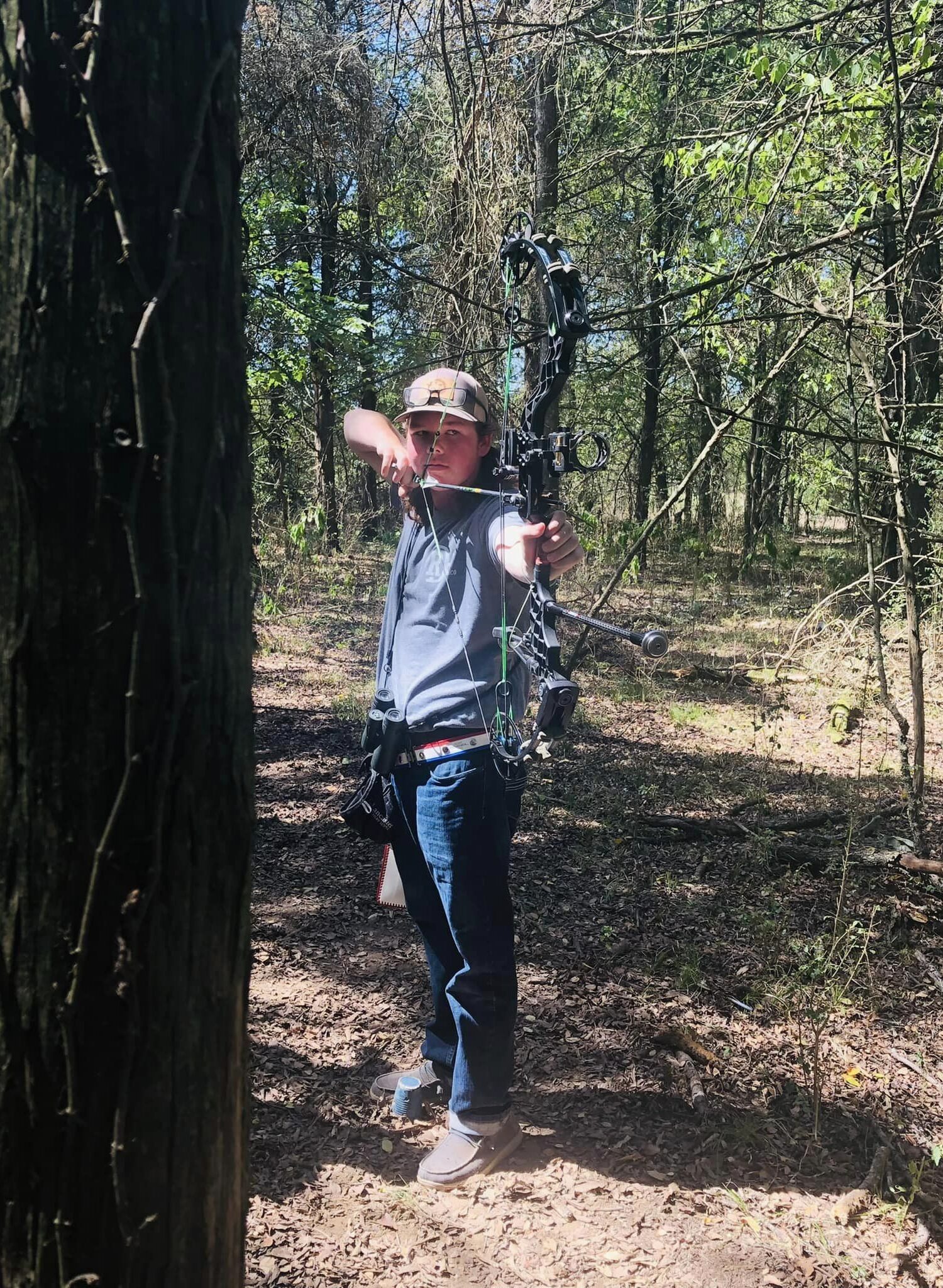 Clayton Porterfield Anchored and aiming at Target with Hunting Bow Setup.